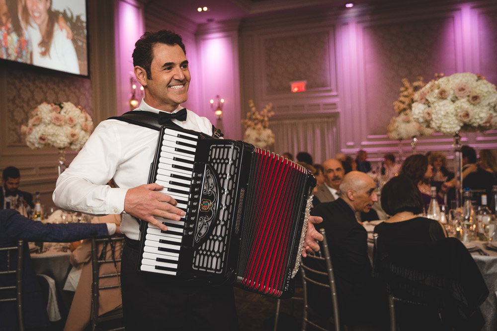 Lucio Raggiunti playing accordion portrait